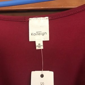 Woman’s Burgundy one piece jumper. NWT